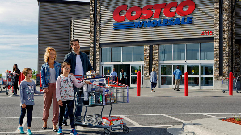 Family outside of a Costco store